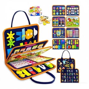 Detail view of Montessori busy board with zippers, buttons and alphabet learning elements