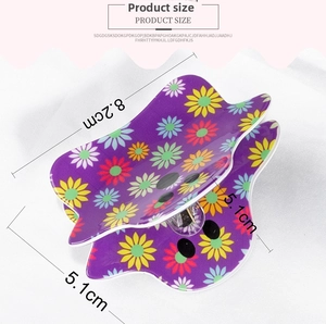 Detailed view of a purple floral hair claw clip measuring 8.2cm by 5.1cm for women
