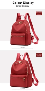 Red Oxford fabric backpacks in small and large sizes with gold zippers for comparison
