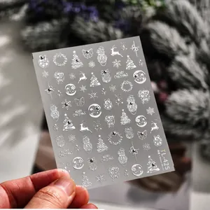 Detail of Christmas nail art stickers TL-425 with embossed reindeer and tree patterns