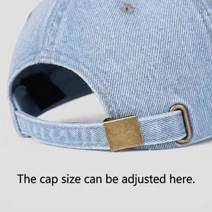 Faded blue denim baseball cap with an adjustable vintage gold metal buckle strap