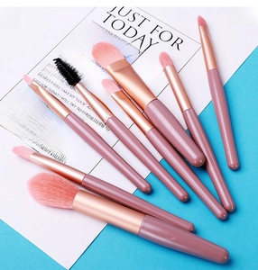 Detailed view of 8-piece pink makeup brush set with soft bristles and rose gold ferrule