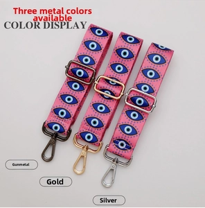 Adjustable polyester straps with blue Evil Eye pattern and metal hardware options