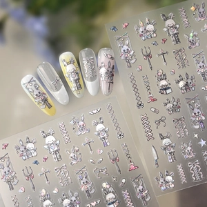 Gothic Lolita nail art stickers with dark rabbit, cross and bow designs on long nails