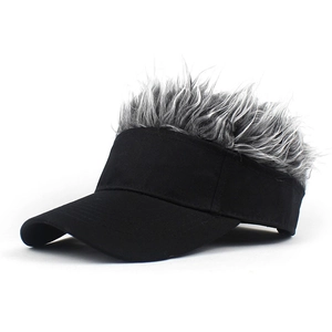 Detail view of the black baseball cap with grey wig hair on top for a fun look