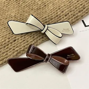 French style 3D bow hair clip set in cream and coffee colors with elegant black edges