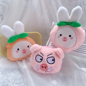 Cute plush pig and bunny coin purses for lipstick and headphone storage on white lace