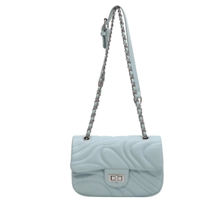 Stylish light blue quilted chain crossbody bag with silver hardware and wave pattern
