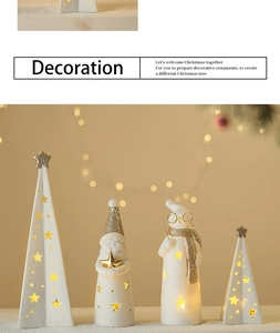Detail of glowing ceramic Christmas tree and Santa figurines with warm LED light