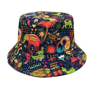 Close-up of ethnic bucket hat featuring vibrant elephant and tribal geometric patterns