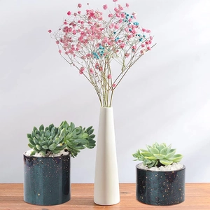 Cilindrische donkergroene keramische succulentenpotten met gouden spetterontwerp
