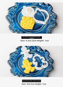 Detail of Christmas cookie cutters showing ginger man and snow globe with dimensions