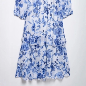 Floral chiffon V-neck dress with blue porcelain print and ruffled tiered hemline