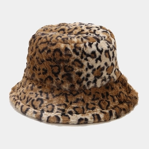 Close-up of thick leopard print faux fur fabric and texture on a winter bucket hat