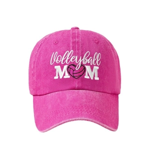 Washed deep pink baseball cap featuring white Volleyball MOM heart embroidery