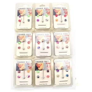 Macro view of 316L surgical steel piercing kits with multi-color replacement balls