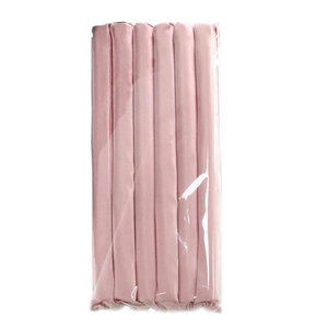 Detail of pink satin heatless hair curlers organized in a clear plastic package