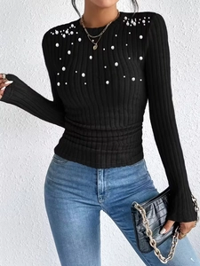 Elegant ribbed black long sleeve top with pearl embellishments and round neckline