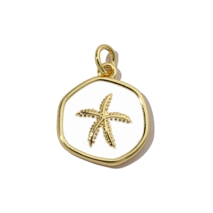 Detailed macro view of a gold-edged starfish pendant with white enamel finish