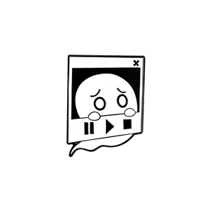 Macro detail of enamel ghost brooch badge featuring a unique video player design