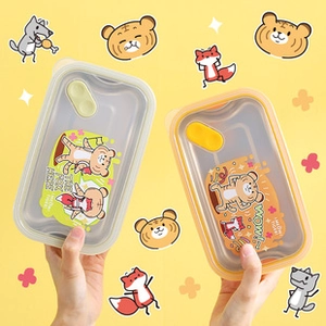 Detail view of kids stainless steel lunch box featuring cartoon fox and tiger lid designs