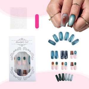 Teal cat-eye press-on nails set with gradient finish, nail file and adhesive tabs