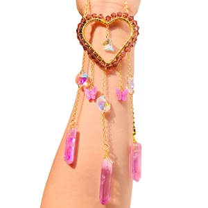Golden heart suncatcher arm jewelry with pink butterfly and crystal prism pendants