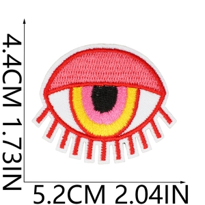 Detailed view of colorful eye embroidery patch with dimensions 4.4cm by 5.2cm