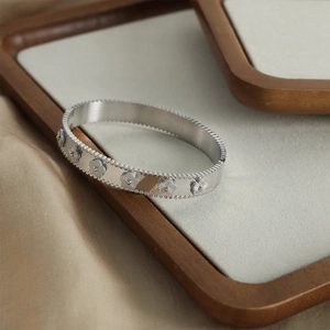 French vintage style 18k gold plated titanium steel floral bangle with millgrain edge