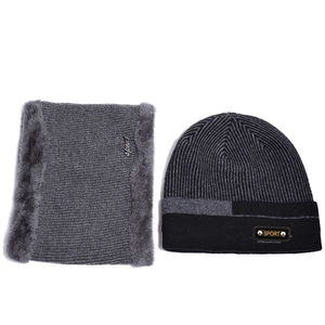 Detail of winter knit hat and scarf set with thick faux fur lining and Sport tag
