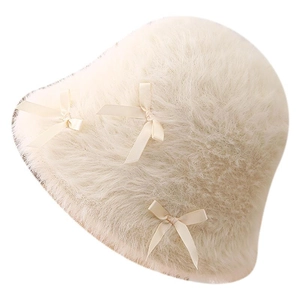 Sweet cream plush bucket hat for women with elegant satin bows in a stylish winter design