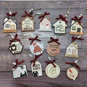 Set of 2025 wooden Christmas ornaments with red plaid bows and festive home themes