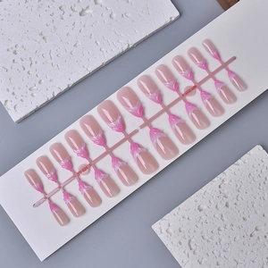 Pink and white marble press-on nails with 3D texture and ocean-themed mermaid finish