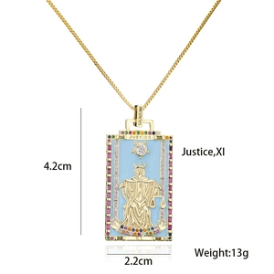Detail view of 18K gold plated Tarot Justice pendant with size and weight measurements