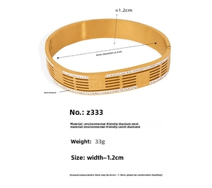 Detailed view of gold titanium steel bangle with geometric hollow design and Czech diamonds
