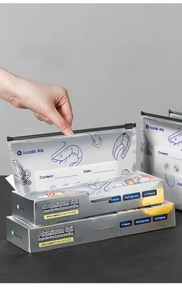 Detailed view of S-size aluminum foil food storage bags in a convenient dispenser box