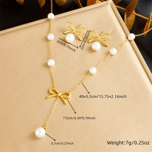 Parure en acier inoxydable doré avec collier nœud perlé et boucles d'oreilles assorties