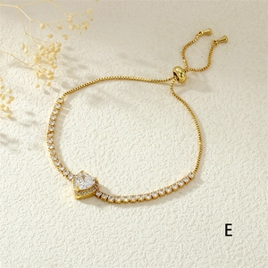 Detail of adjustable gold heart tennis bracelet with micro-pave sparkling cubic zirconia