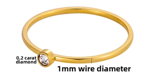 Detail of 1mm thin 18K gold plated stainless steel ring with 0.2ct sparkling zircon