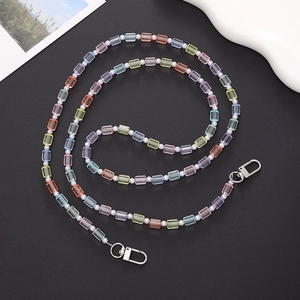 Detail of colorful candy bead crossbody phone strap with clear square beads and silver clasps