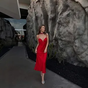 Elegant red satin sleeveless midi dress with slim straps and deep V-neckline for women