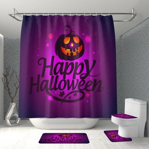Detailed view of Halloween bath set with glowing pumpkins on a deep purple background