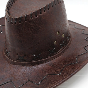 Detailed close-up of dark brown cracked faux leather cowboy hat with stitched cross details