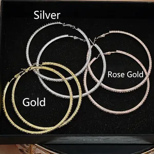 Classic trio of silver, gold, and rose gold hoop earrings with sparkling rhinestones