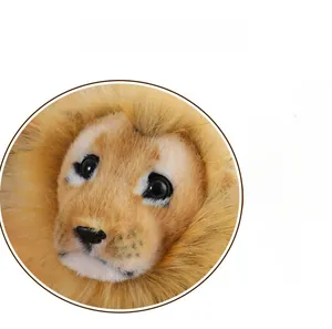 Close-up of realistic plush lion head showing soft fluffy fur and detailed expressive eyes