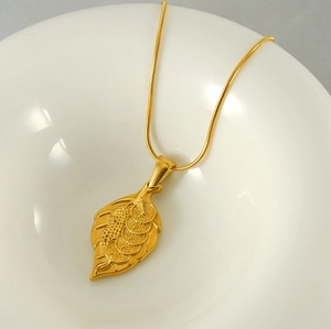 Gold plated titanium steel necklace with lucky leaf, peanut and coin pendant