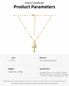 Detail of S925 sterling silver cross pendant with 18K gold plating and cubic zirconia