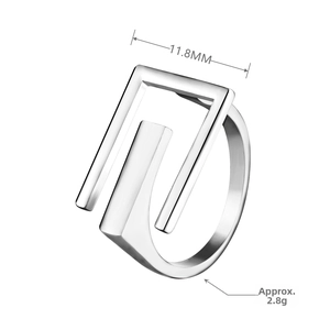 Detail showing the 11.8mm width and 2.8g weight of the hollow letter E geometric ring