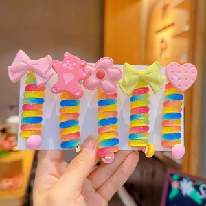 Set of 5 colorful spiral hair ties with cute cartoon bow, bear, and flower charms