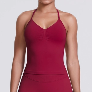 Detail of burgundy seamless yoga tank top with gathered chest and high elasticity texture